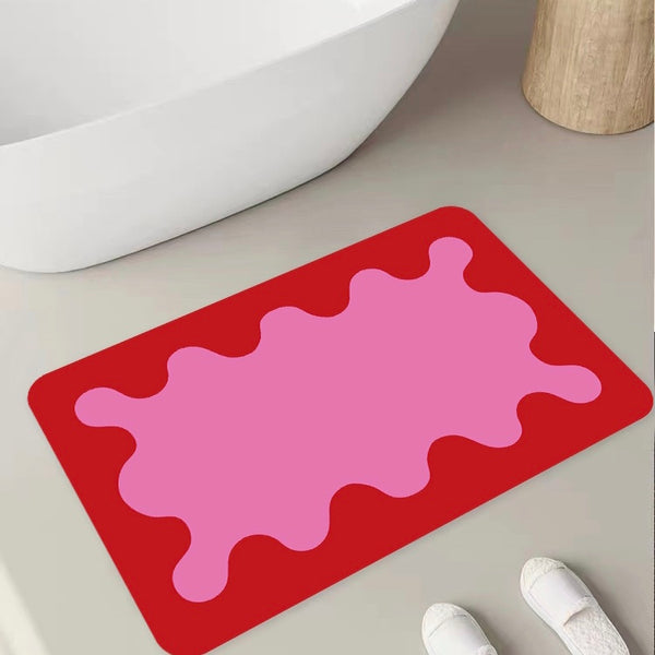 Coral Bath Mat in Sunburn